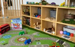 Imaginative play corner at Monkey Puzzle Aylesbury